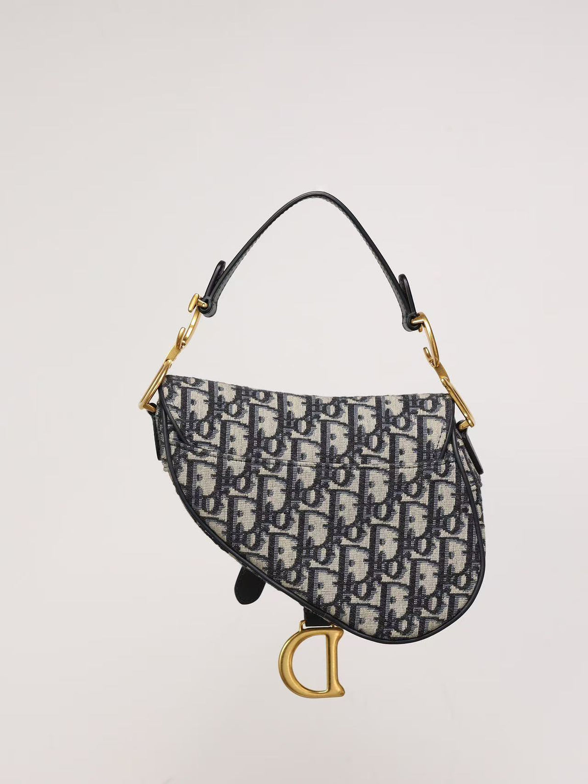 Premium Beige & Black Patterned Saddle Bag with Gold-Tone Details