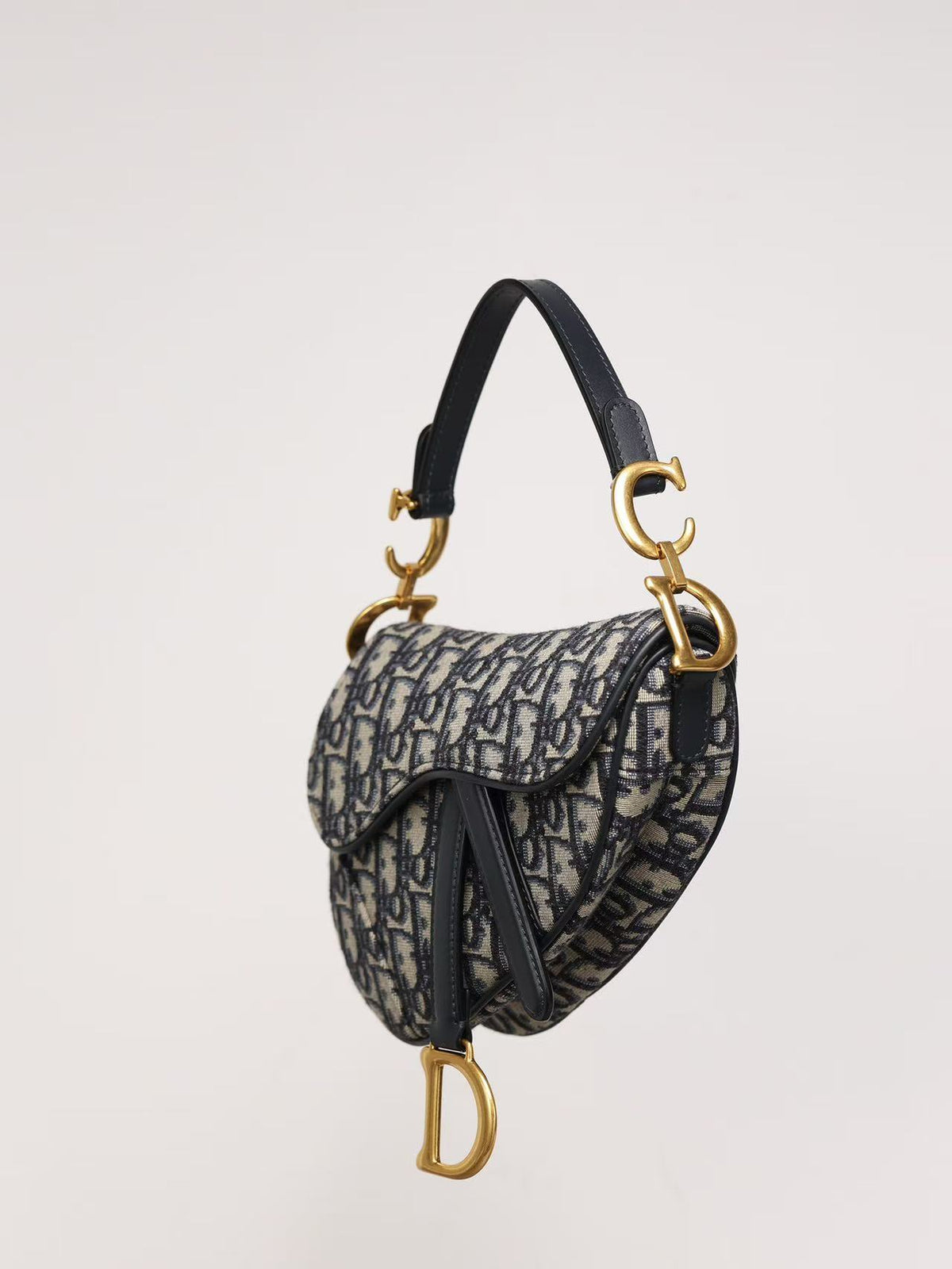 Premium Beige & Black Patterned Saddle Bag with Gold-Tone Details